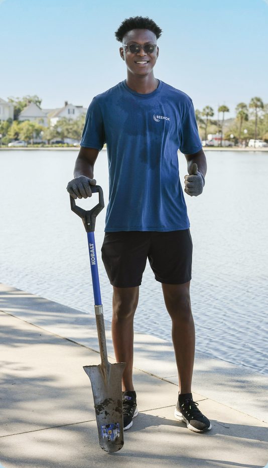 A Beemok team member volunteering outdoors