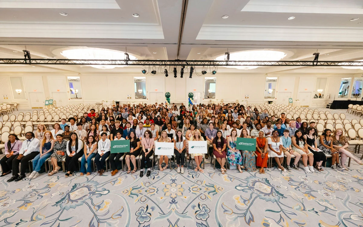 Large group of people seated in a ballroom for a Meeting Street Scholarship event.